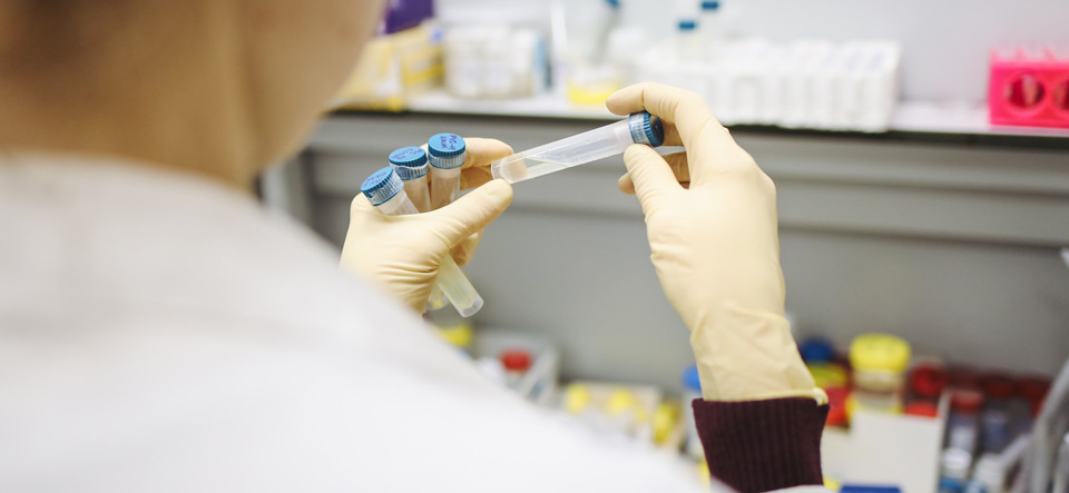 Lab technician testing a liquid