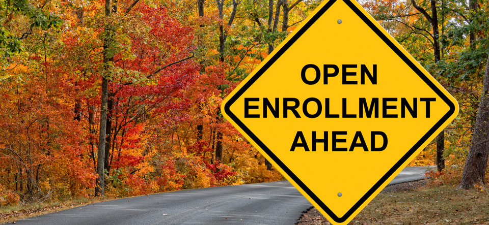 Open Enrollment Caution Sign With Autumn Road Background