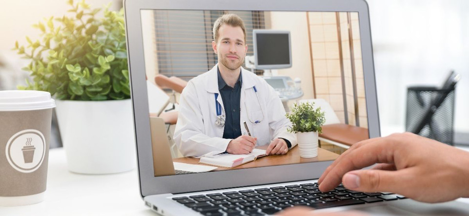 Person utilizing telehealth services on a laptop