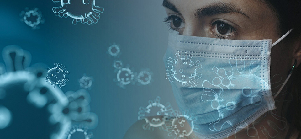 Female wearing a mask for protection from the COVID 19 virus
