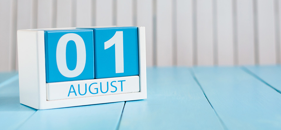 August 1st. Image of august 1 wooden color calendar on blue background. Summer day. Memorial Day of Victims of the First World War.
