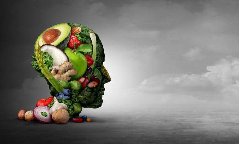 Vegan and vegetarian psychology concept with a group of fruit nuts beans and vegetable as an eating lifestyle and thinking healthy diet as farm fresh produce shaped as a head in a 3D illustration style.