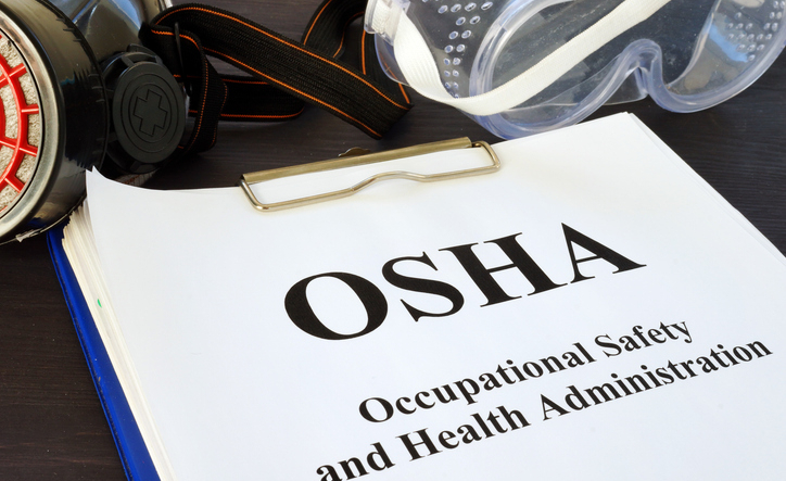 Pile of documents with Occupational Safety and Health Administration OSHA.